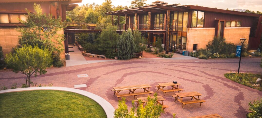 Prescott College campus buildings and picnic benches