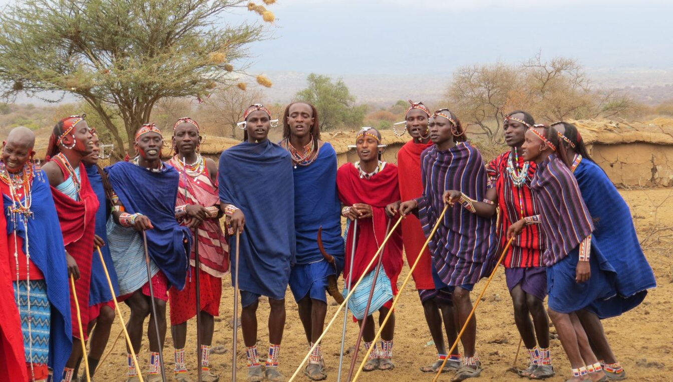 This picture is of a warrior training village in Amboseli, a community committed to cultural survival in spite of the hardship of living on dry land.